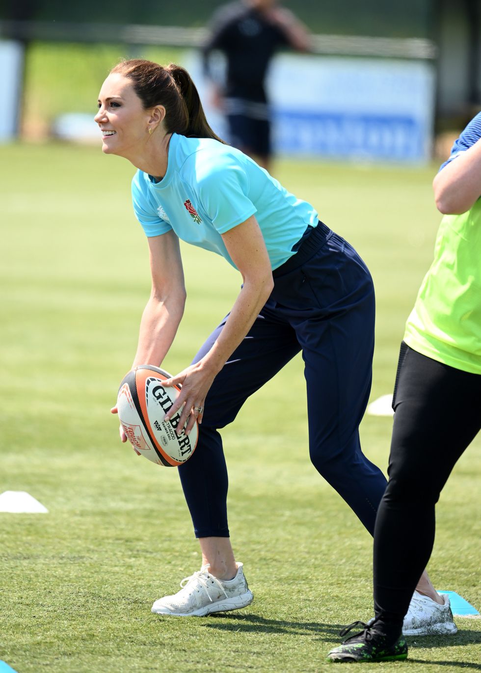Kate Middleton Shows Off Her Sporty Side in Blue Top and Trousers