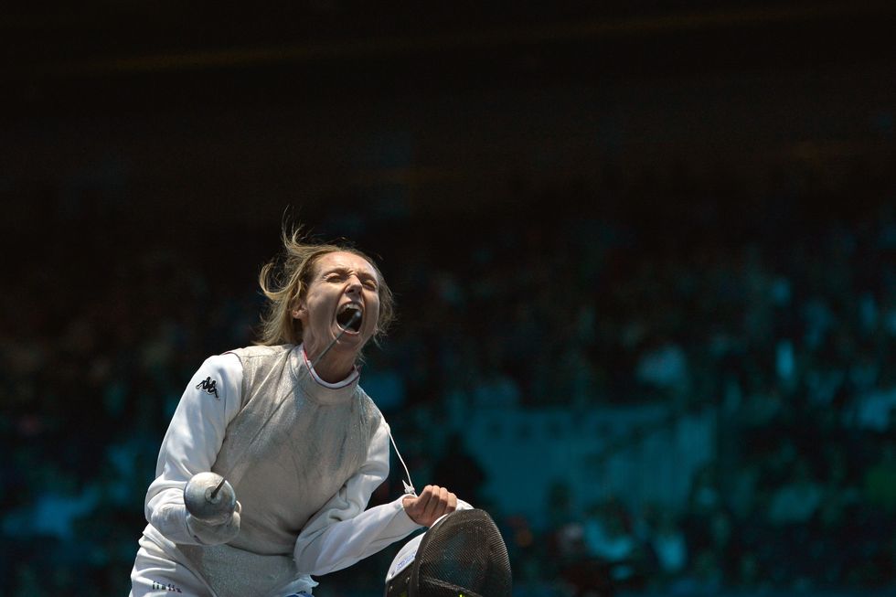 italys valentina vezzali reacts during her fight against frances astrid guyart in the womens foil team semi finals as part of the fencing event of london 2012 olympic games, on august 2, 2012 at the excel centre in london afp photo  alberto pizzoli        photo credit should read alberto pizzoliafpgettyimages