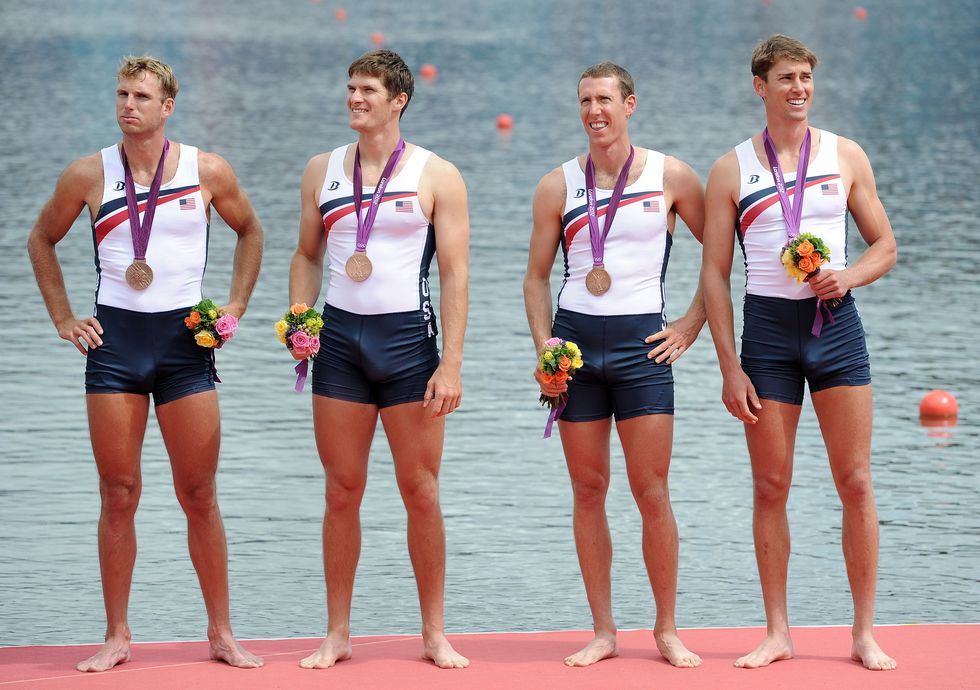 windsor, england   august 04  scott gault, charles cole, henrik rummel and glenn ochal of the united states celebrate with their bronze medals during the medal ceremony for the mens four final on day 8 of the london 2012 olympic games at eton dorney on august 4, 2012 in windsor, england  photo by harry howgetty images