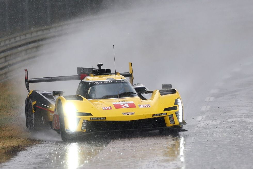 le mans, france june 10 the cadillac racing cadillac v seriesr driven by sebastien bourdais, renger van der zande and scott dixon spins out during a heavy rain shower during the 100th anniversary of the 24 hours of le mans at the circuit de la sarthe on june 10, 2023 in le mans, france photo by clive rosegetty images