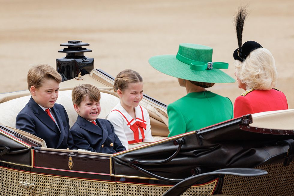 london, england june 17 prince george of wales, princess charlotte of wales and prince louis of wales ride in a horse drawn carriage with catherine, princess of wales and queen camilla during trooping the colour at horse guards parade on june 17, 2023 in london, england trooping the colour is a traditional parade held to mark the british sovereign's official birthday it will be the first trooping the colour held for king charles iii since he ascended to the throne photo by rob pinneygetty images
