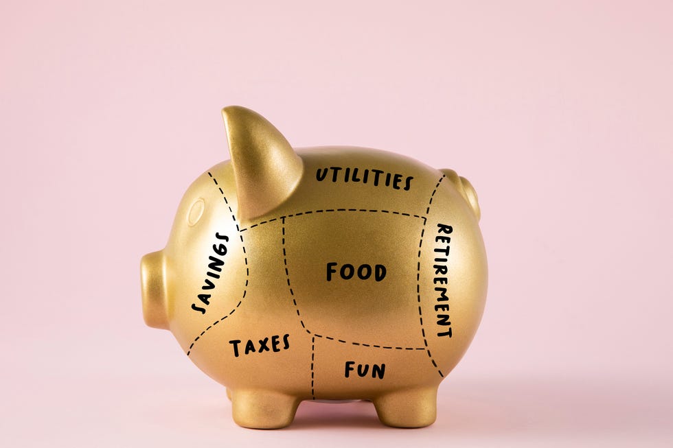 financial planning with piggy bank on pink background