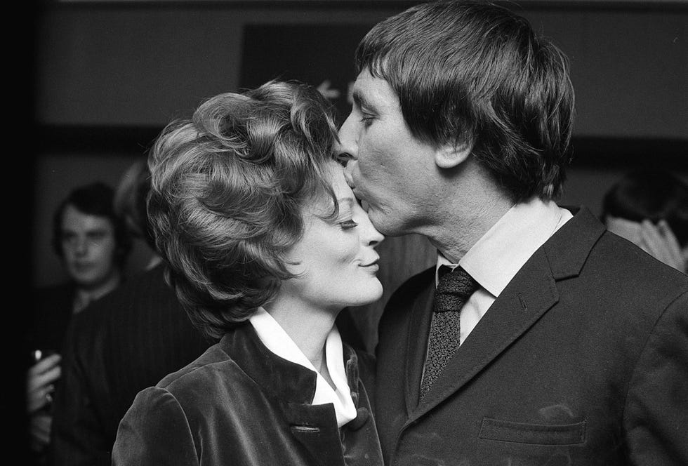 maggie smith, with her husband robert stevens celebrating her oscar winning award with a small party at the old viv 8th april 1970
