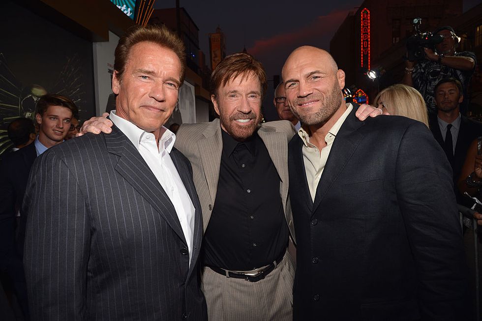 hollywood, ca august 15 actors arnold schwarzenegger, chuck norris and randy couture arrive at the expendables 2 los angeles premiere at graumans chinese theatre on august 15, 2012 in hollywood, california photo by lester cohenwireimage