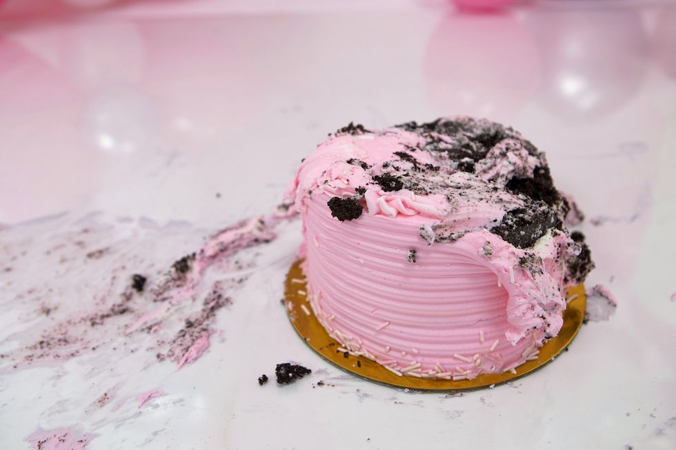 smash cake first birthday side view pink