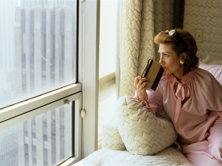 portrait of french born businesswoman helene rochas 1927   2011, president of marcel rochas perfume and fashion house, as she gazes out a window of her elaborately decorated apartment, new york, new york, june 1979 photo by susan woodgetty images