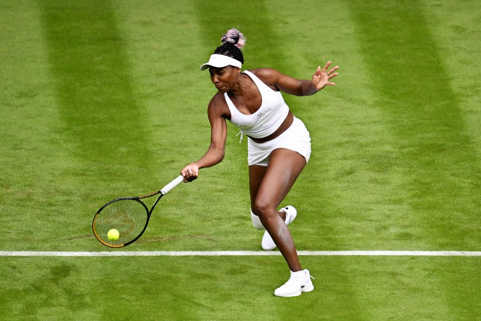 london, england july 03 venus williams of united states plays a forehand against elina svitolina of ukraine in the women's singles first round match on day one of the championships wimbledon 2023 at all england lawn tennis and croquet club on july 03, 2023 in london, england photo by shaun botterillgetty images