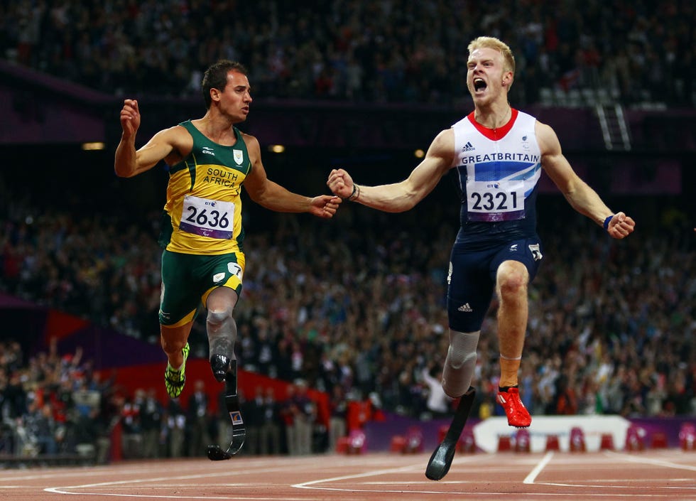 london, england september 06 l r arnu bronze medalist arnu fourie of south africa and gold medalist jonnie peacock of great britain cross the line in the mens 100m t44 final on day 8 of the london 2012 paralympic games at olympic stadium on september 6, 2012 in london, england photo by julian finneygetty images