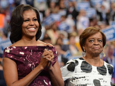 first lady michelle obama and her mother marian robinson clap to a speech at the time warner cable arena in charlotte, north carolina, on september 6, 2012 on the final day of the democratic national convention dnc us president barack obama is expected to accept the nomination from the dnc to run for a second term as president   afp photo  robyn beck        photo credit should read robyn beckafpgettyimages