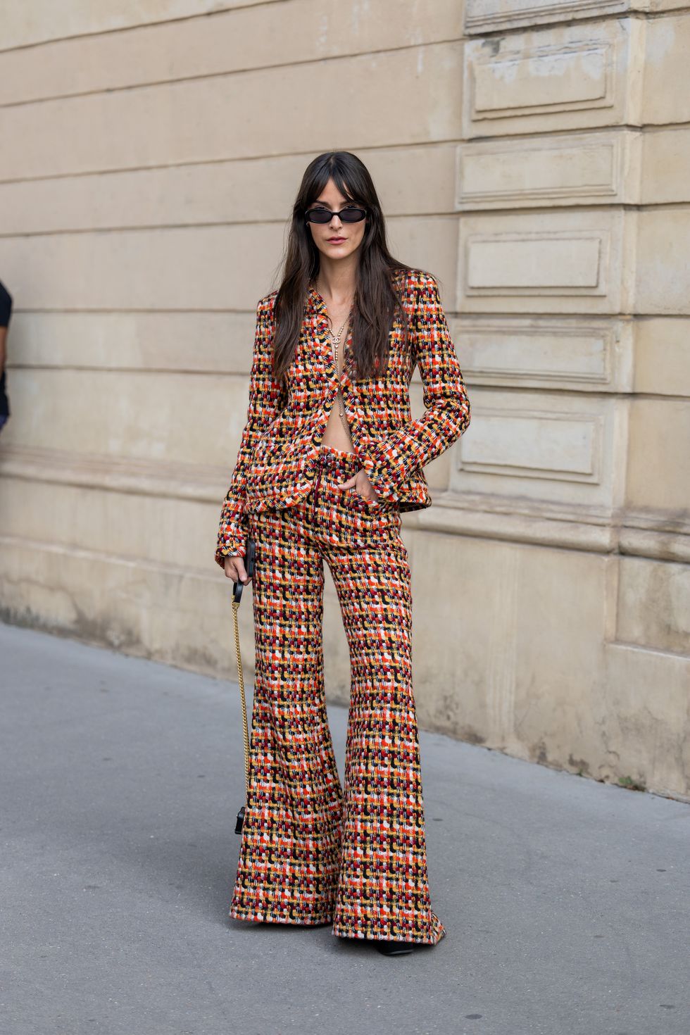 paris, france july 04 leia sfez is seen wearing knitted blazer, flared pants, mini bag, sunglasses outside chanel during the haute couture fallwinter 20232024 as part of paris fashion week on july 04, 2023 in paris, france photo by christian vieriggetty images