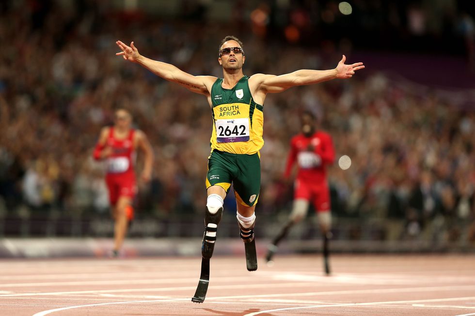 Oscar Pistorius celebrates as he wins gold in the Men's 400m T44 Final at the 2012 Paralympic Games on September 8, 2012, in London, England