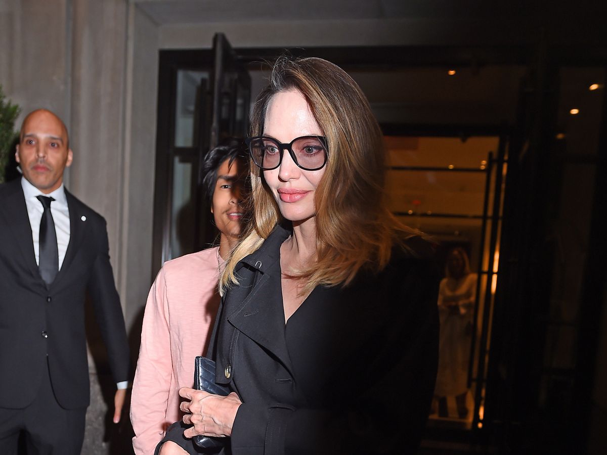 Angelina Jolie Perfects Transitional Dressing in Black Maxi Dress