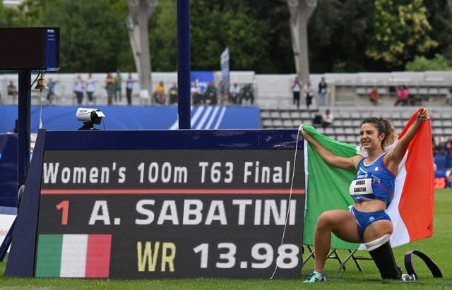 paris, france july 13 ambra sabatini of italy poses for a photo after winning and setting a new world record in the womens in the womens 100m t63 final during day six of the para athletics world championships paris 2023 at stade charlety on july 13, 2023 in paris, france photo by matthias hangstgetty images