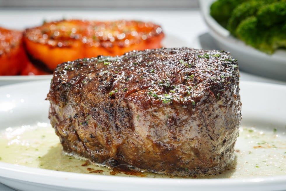 the filet with broiled tomatoes and broccoli at ruths chris steakhouse