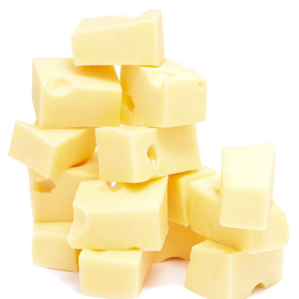 cheese cubes isolated on white