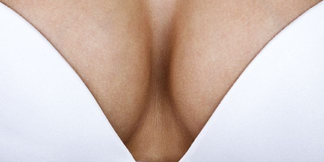 Symptoms of Overly Large Breasts