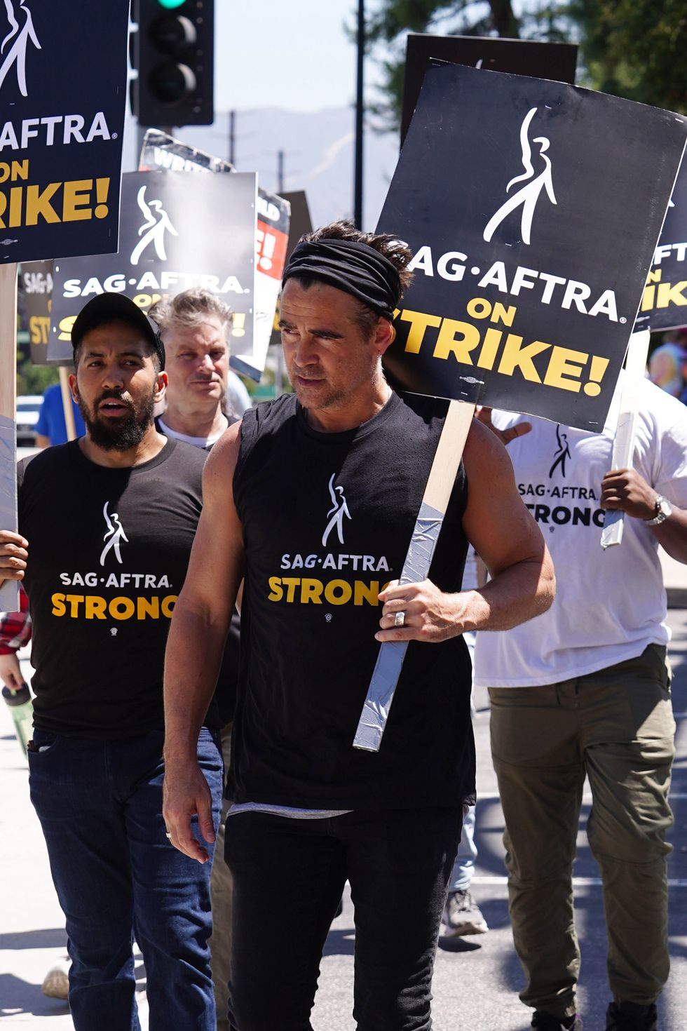 los angeles, ca july 26 neil brown jr, shea whigham and colin farrell walk the picket line in support of the sag aftra and wga strike on july 26, 2023 in los angeles, california photo by hollywood to youstar maxgc images