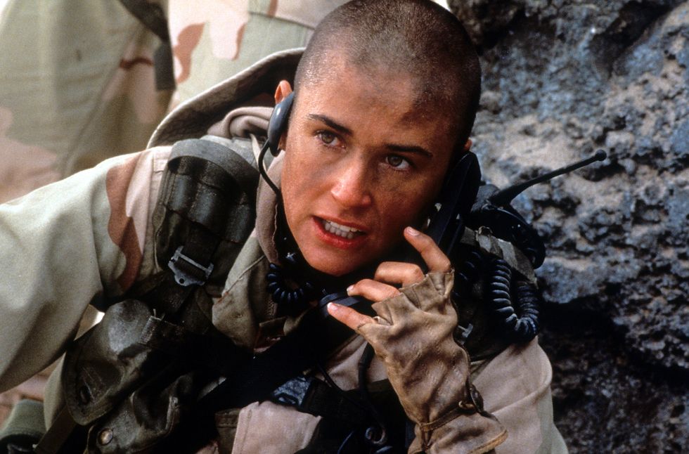 Demi Moore talking on a walkie-talkie in a scene from Jane Jane, 1997, photo buena vistagetty images