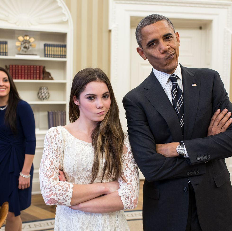 washington, dc   november 15  in this handout image provided by the white house, us president barack obama jokingly mimics us olympic gymnast mckayla maroneys not impressed expression while greeting members of the 2012 us olympic gymnastics teams in the oval office november 15, 2012 at the white house in washington, dc maroneys expression became an internet sensation when during the ceremony for her 2012 olympic vault silver medal she was photographed giving a brief look of disappointment with her lips pursed to the side steve penny, usa gymnastics president, and savannah vinsant laugh at left photo by pete souzathe white house via getty images