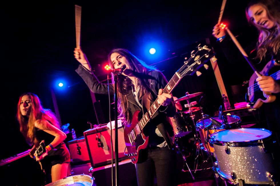 cologne, germany   november 06 l r alana, danielle and este haim of haim performs on stage at the blue shell on november 06, 2012 in cologne, germany  photo by peter wafzigredferns via getty images