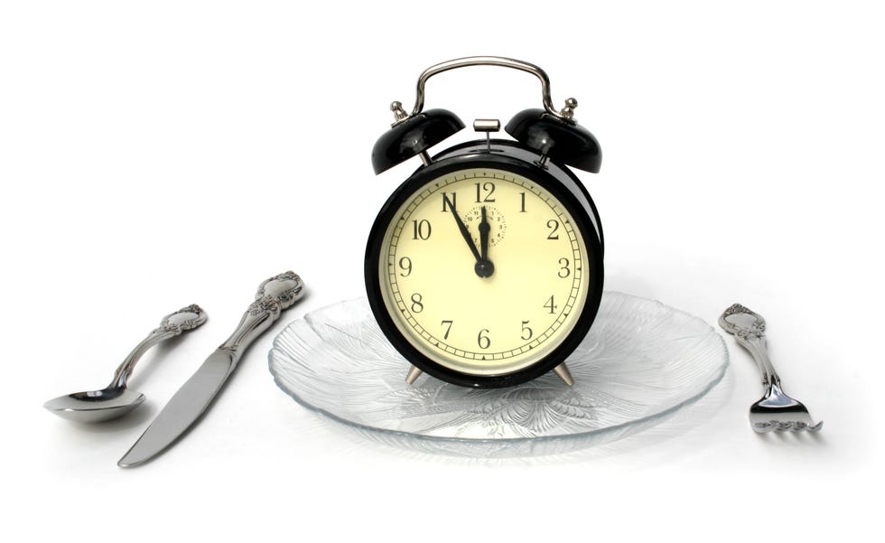 reloj, cubiertos, mesa