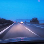 Foggy dangereous driving on the german autobahn seen from the drivers seat