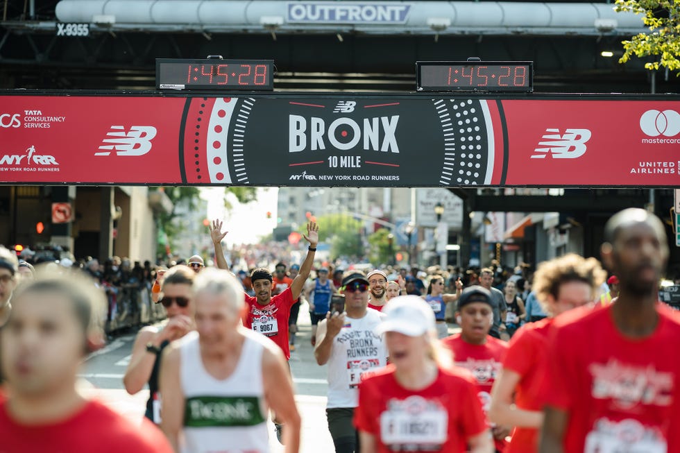 new york city, united states september 18 runners cross the finish line at the 2022 new balance bronx 10 mile race held on september 18, 2022 photo by carla torres new york road runners via getty images
