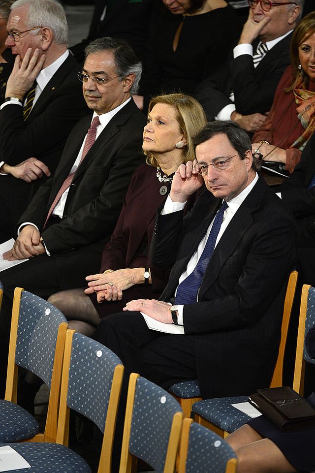 italian banker, economist and president of the european central bank mario draghi r and his wife wait at the city hall in oslo on december 10, 2012 before the nobel peace prize awarding ceremony the eu collects this years prestigious nobel peace prize, with the bloc battered and divided by a three year economic crisis threatening the continents social stability
 afp photo  john macdougall        photo credit should read john macdougallafp via getty images