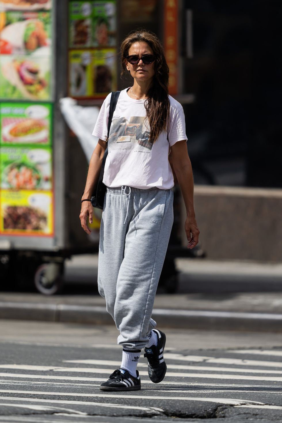 Katie Holmes Goes Casual in a Graphic Tee, Sweats, and Sneakers