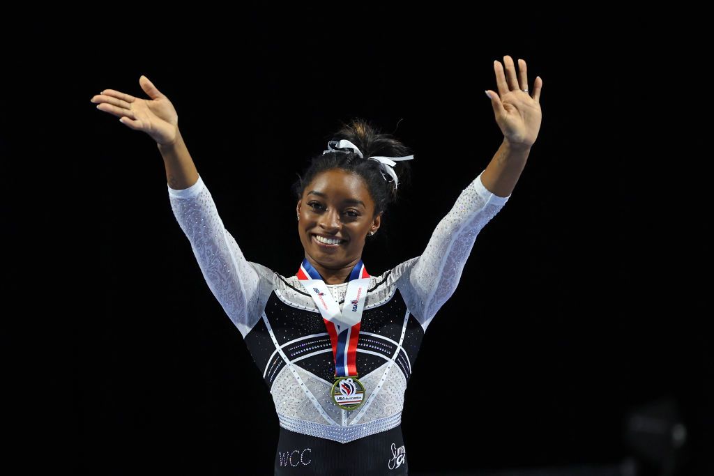 hoffman estates, illinois august 05 simone biles celebrates after winning the all around at the core hydration classic at now arena on august 05, 2023 in hoffman estates, illinois photo by stacy reveregetty images