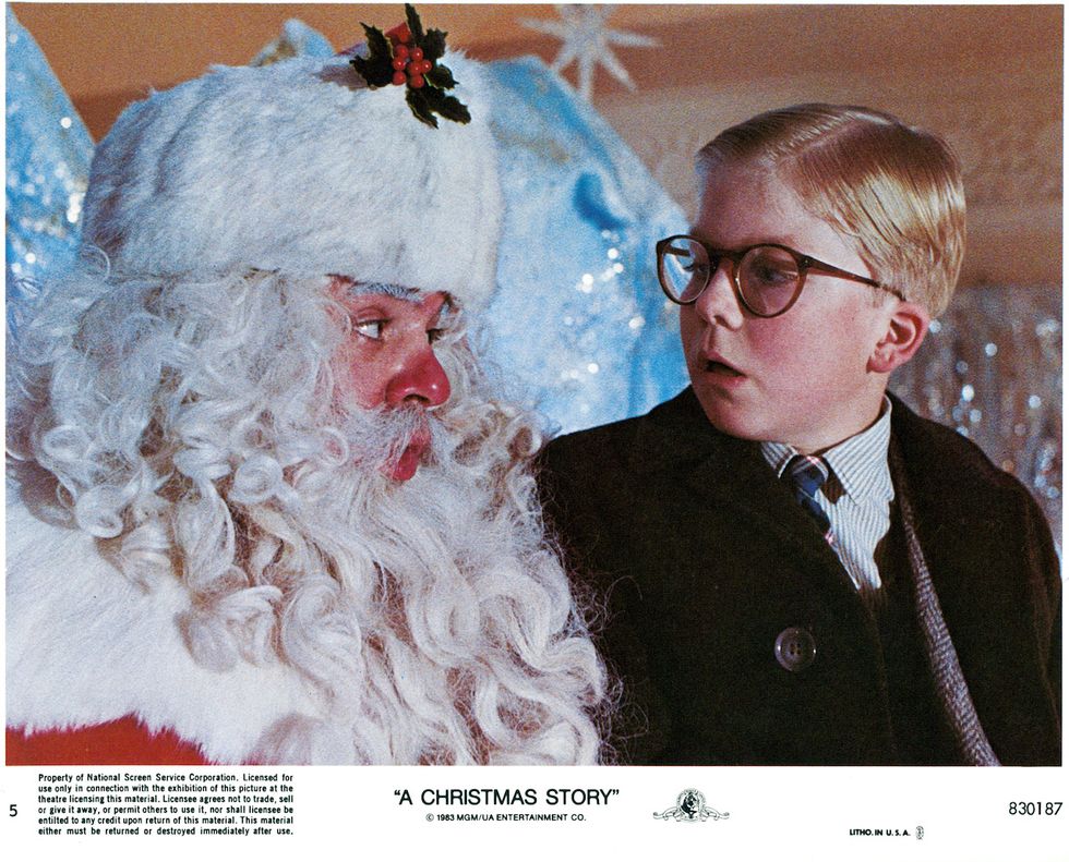 peter billingsley sits on santa's lap in a scene from the film 'a christmas story', 1983 photo by metro goldwyn mayergetty images