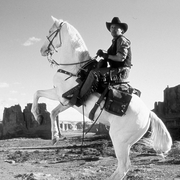 billy crystal on a white stallion in a scene from the film 'city slickers ii the legend of curly's gold', 1994 photo by columbia picturesgetty images