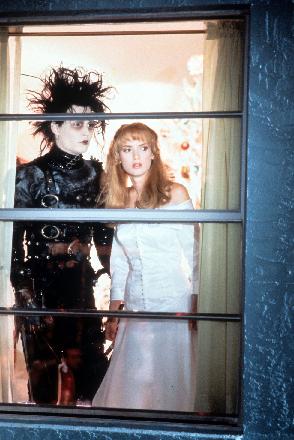 johnny depp and winona ryder looking out window in a scene from the film edward scissorhands, 1990 photo by 20th century foxgetty images