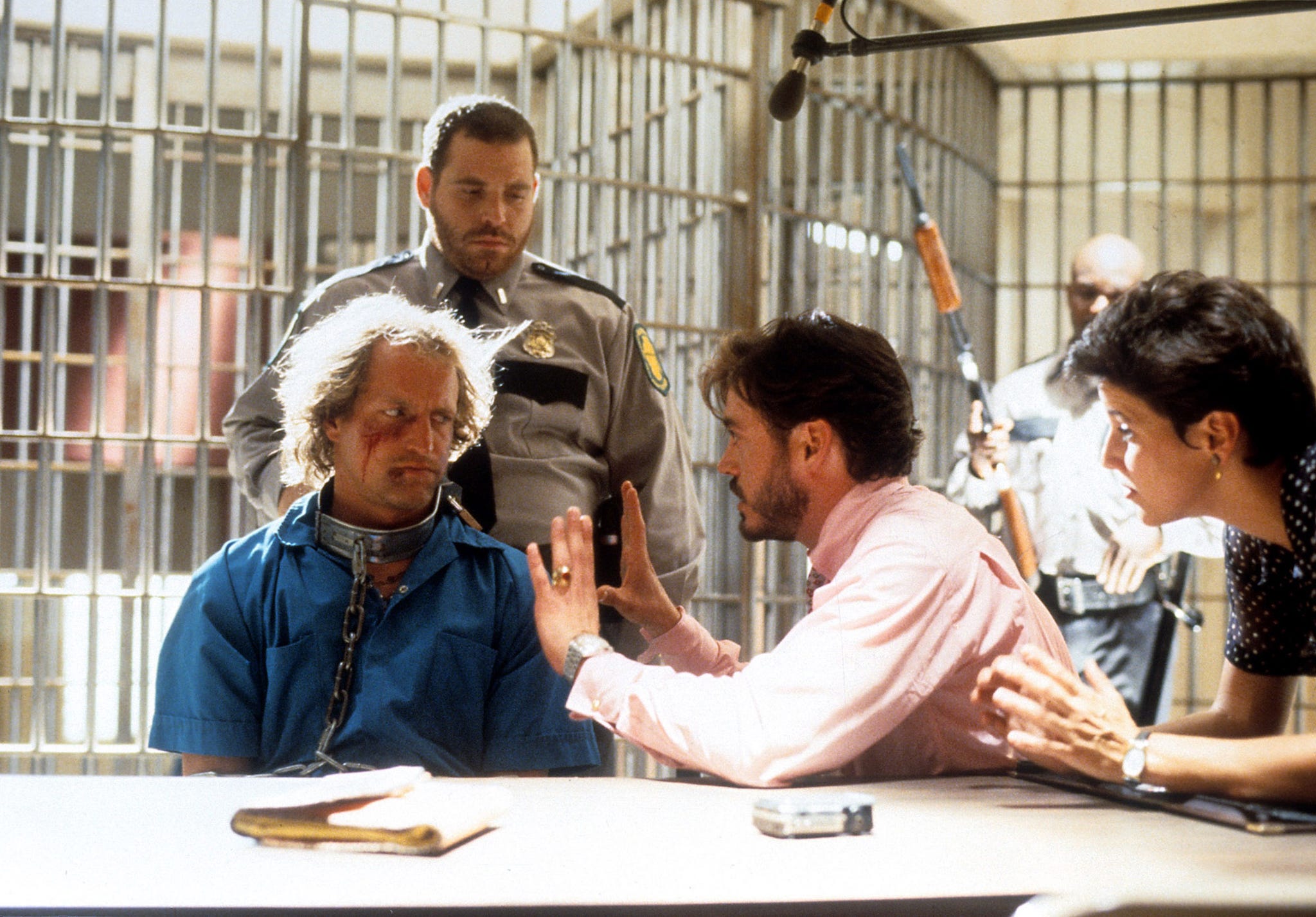 woody harrelson sits in jail with robert downey jr in a scene from the film 'natural born killers', 1994 photo by warner brothersgetty images