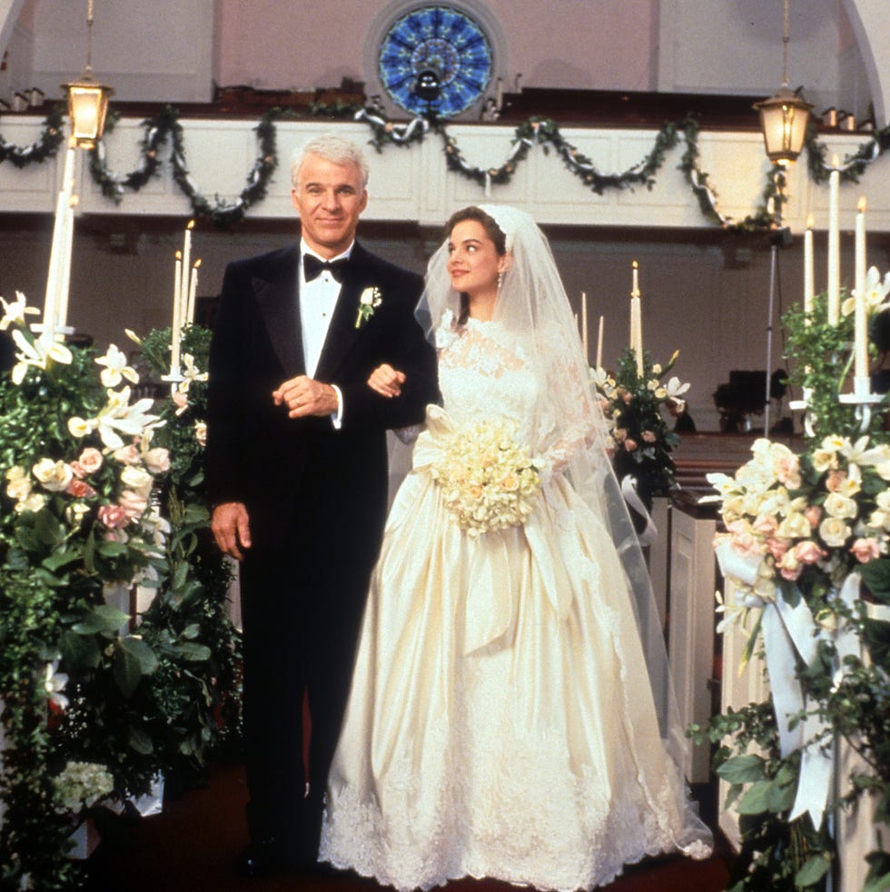 Steve Martin And Kimberly Williams-Paisley In 'Father Of The Bride' steve martin walking down the aisle with kimberly williams paisley in a scene from the film father of the bride, 1991. (photo by touchstone/getty images)
