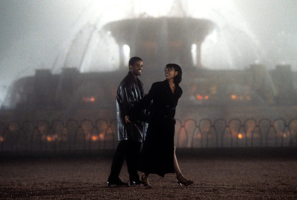 larenz tate and nia long having a romantic walk in a scene from the film love jones, 1997. (photo by addis wechsler pictures/getty images)
