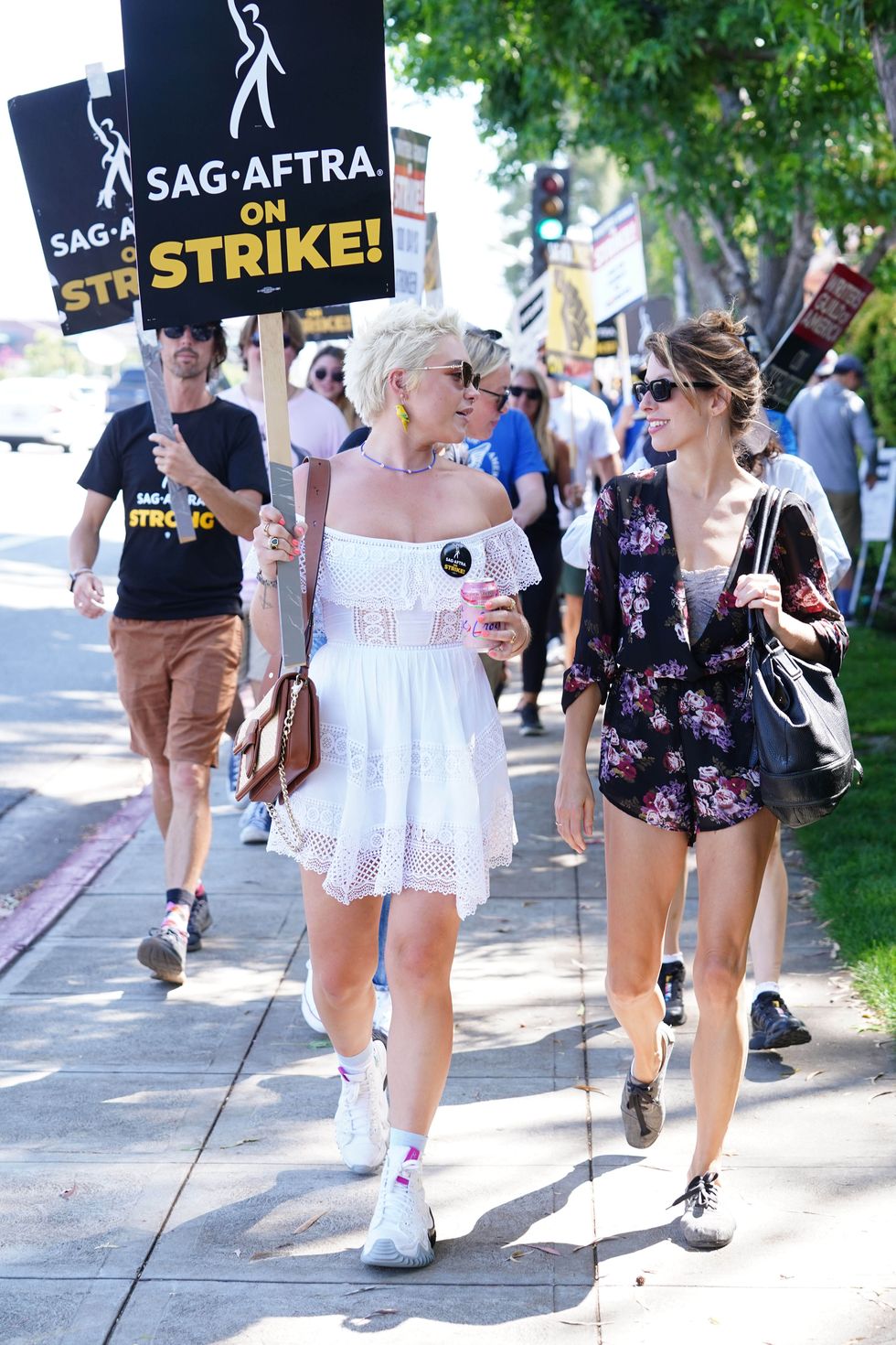 los angeles, ca august 15 florence pugh l walks the picket line in support of the sag aftra and wga strike at disney studios on august 15, 2023 in burbank, california photo by hollywood to youstar maxgc images