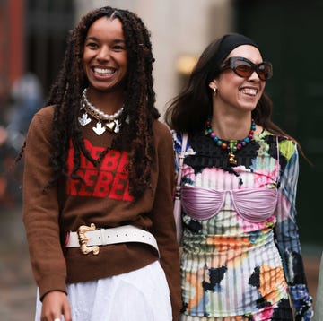 a couple of women smiling