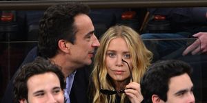 new york, ny   february 04  olivier sarkozy and mary kate olsen attend the detroit pistons vs new york knicks game at madison square garden on february 4, 2013 in new york city  photo by james devaneywireimage