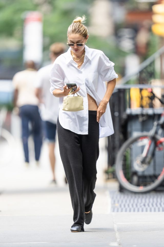 Gigi Hadid Is Cool in an Oversize White Shirt and Cashmere Pants