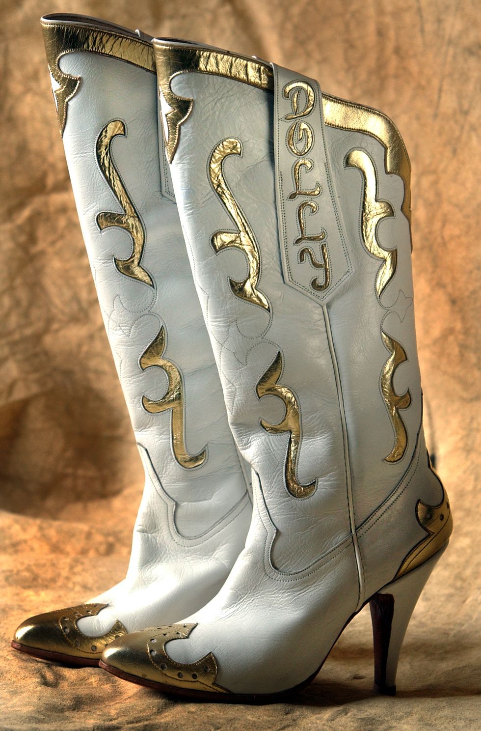 Footwear, Boot, Shoe, Cowboy boot, Durango boot, Font, Riding boot, High heels, Metal, 