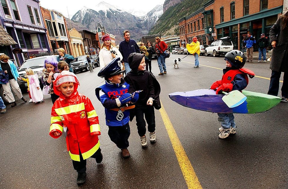 telluride school children enjoy the sights as they join in tellurides halloween parade