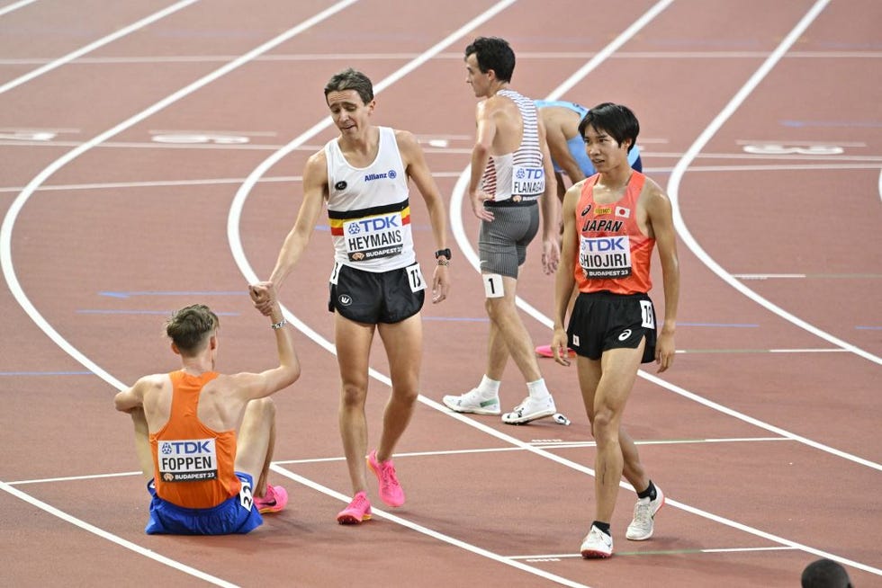 dutch mike foppen and belgian john heymans greet each other after the heats of the mens 5000m race at the world athletics championships in budapest, hungary on thursday 24 august 2023 the worlds are taking place from 19 to 27 august 2023 belga photo eric lalmand photo by eric lalmand belga mag belga via afp photo by eric lalmandbelga magafp via getty images