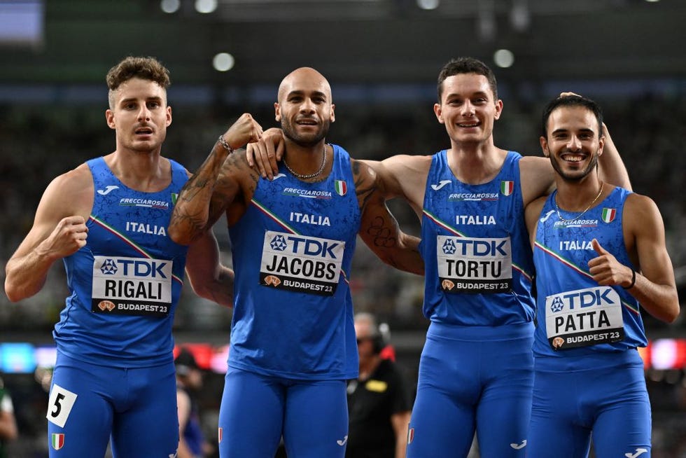 italys roberto rigali, italys lamont marcell jacobs, italys filippo tortu and italys lorenzo patta pose for a picture after the mens 4x100m relay heats during the world athletics championships at the national athletics centre in budapest on august 25, 2023 photo by jewel samad afp photo by jewel samadafp via getty images