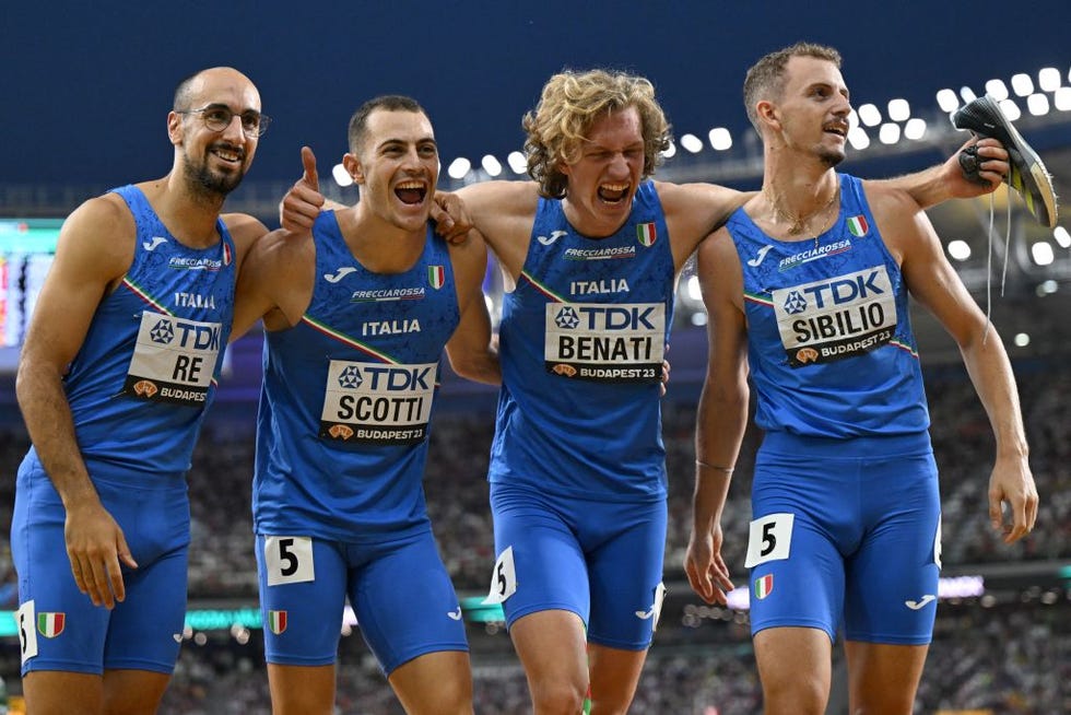l to r italys davide re, edoardo scotti, lorenzo benati, and alessandro sibilio pose for a photo after the mens 4x400m relay heats during the world athletics championships at the national athletics centre in budapest on august 26, 2023 photo by jewel samad afp photo by jewel samadafp via getty images