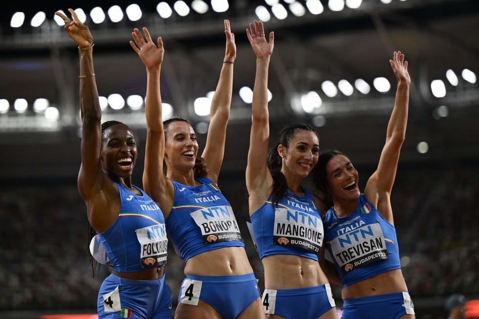 l to r italys ayomide folorunso, alessandra bonora, alice mangione, and giancarla trevisan pose for a photo after the womens 4x400m relay heats during the world athletics championships at the national athletics centre in budapest on august 26, 2023 photo by jewel samad afp photo by jewel samadafp via getty images