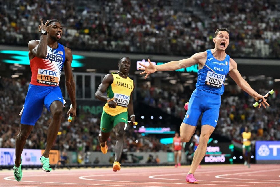 usas noah lyles and italys filippo tortu react after the mens 4x100m relay final during the world athletics championships at the national athletics centre in budapest on august 26, 2023 photo by jewel samad afp photo by jewel samadafp via getty images