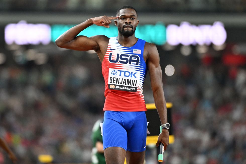 usas rai benjamin reacts after crossing the finish line with the baton to win the mens 4x400m relay final during the world athletics championships at the national athletics centre in budapest on august 27, 2023 photo by jewel samad afp photo by jewel samadafp via getty images