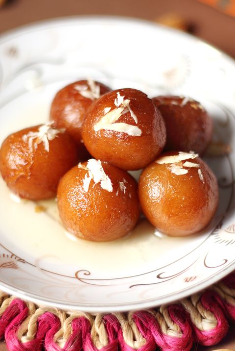 gulab jamun is very popular indian dessert made with fresh homemade khoya, soaked in warm sugar surup