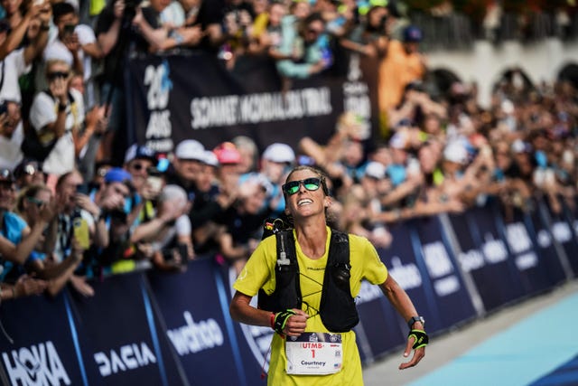 topshot us trailer courtney dauwalter celebrates as she crosses the finish line to win the 20th edition of the ultra trail du mont blanc (utmb), a 173km trail race crossing france, italy and switzerland in chamonix, south eastern france on september 2, 2023. (photo by jeff pachoud / afp) (photo by jeff pachoud/afp via getty images)